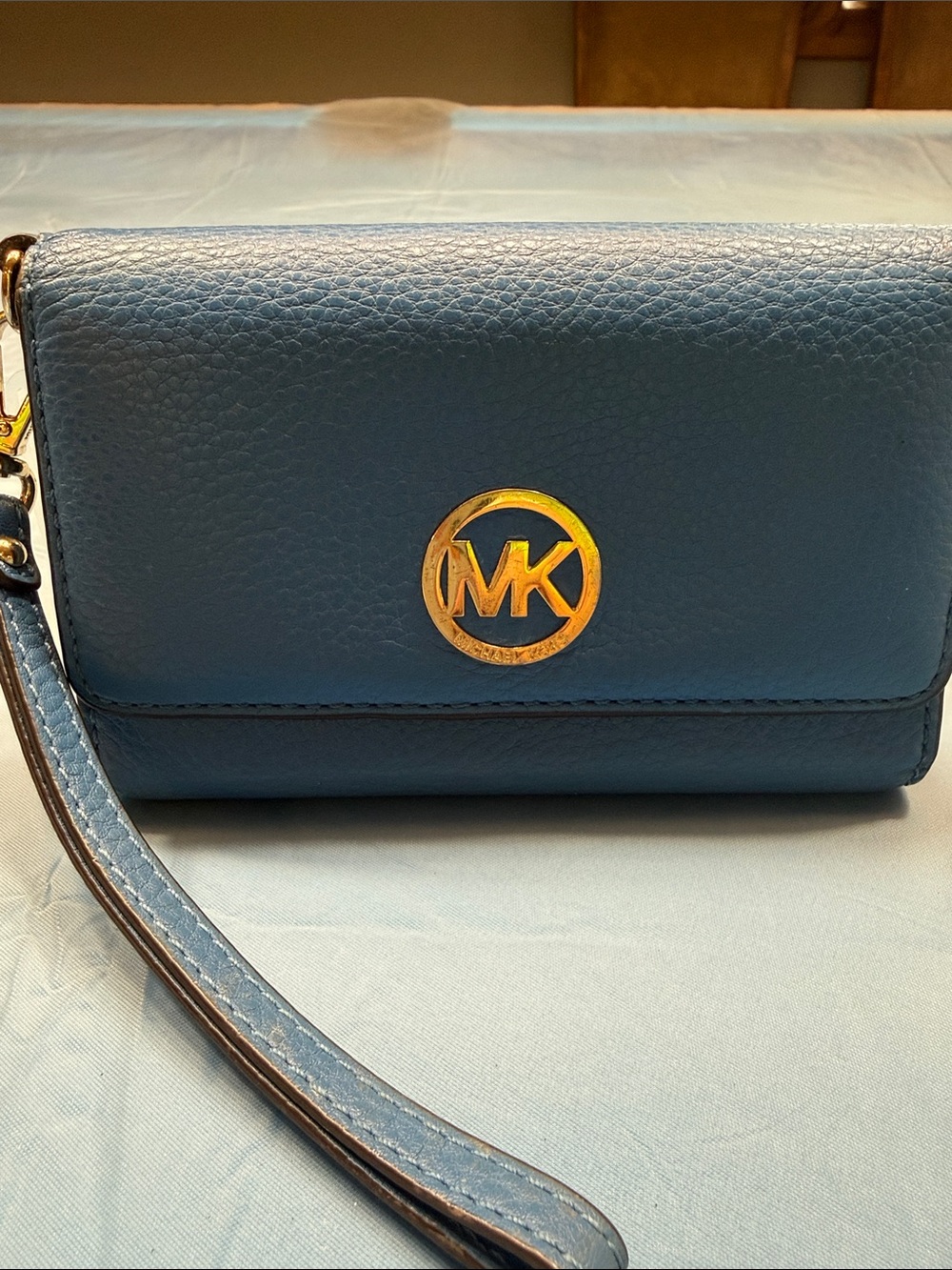Michael Kors Blue Pebbled Leather Wristlet with Gold MK Emblem